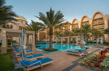 Pool image for: Apartment - 2 Bedrooms - 2 Bathrooms for rent in Sarai Apartments - Palm Jumeirah - Dubai, Image 1