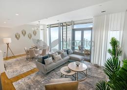 Living / Dining Room image for: Apartment - 2 bedrooms - 2 bathrooms for sale in Bluewaters Bay Building 2 - Bluewaters Bay - Bluewaters - Dubai, Image 1