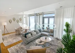 Living / Dining Room image for: Apartment - 2 Bedrooms - 2 Bathrooms for sale in Bluewaters Bay Building 2 - Bluewaters Bay - Bluewaters - Dubai, Image 1