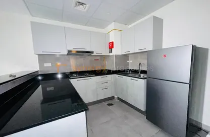 صورة لـ مطبخ شقة - غرفة نوم - 2 حمامات للايجار في سنتوريون أونيكس - ميدان - دبي ، صورة رقم 1