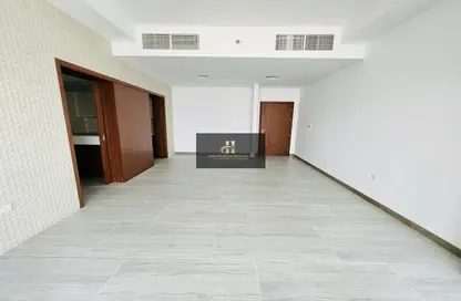 Empty Room image for: Apartment - 2 Bedrooms - 2 Bathrooms for sale in Hameni Tower - Jumeirah Village Circle - Dubai, Image 1