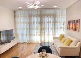 Living Room image for: Apartment - 1 bedroom - 2 bathrooms for rent in Burj Daman - DIFC - Dubai, Image 1