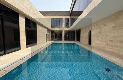 Villa - 4 Bedrooms - 7 Bathrooms for rent in Wadi Alshabak - Dubai