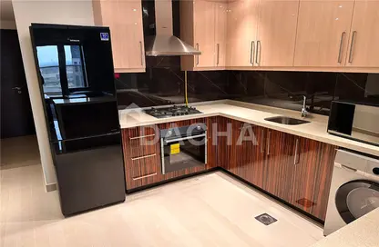 Kitchen image for: Apartment - 1 Bedroom - 2 Bathrooms for rent in Elite Downtown Residence - Downtown Dubai - Dubai, Image 1