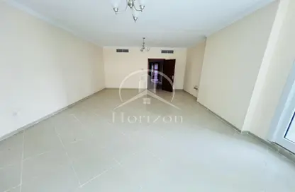 Empty Room image for: Apartment - 2 Bedrooms - 2 Bathrooms for rent in Al Taawoon Towers - Al Khan - Sharjah, Image 1
