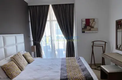 Room / Bedroom image for: Apartment - 1 Bedroom - 2 Bathrooms for sale in Hub Canal 1 - Hub-Golf Towers - Dubai Sports City - Dubai, Image 1