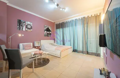 Living / Dining Room image for: Apartment - 1 Bathroom for sale in Burj Al Nujoom - Downtown Dubai - Dubai, Image 1