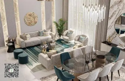 Living / Dining Room image for: Villa - 5 Bedrooms for sale in Nad Al Sheba Gardens - Nad Al Sheba 1 - Nad Al Sheba - Dubai, Image 1