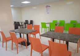صورةغرفة الطعام لـ: سكن عمال - 8 حمامات للكراء في المرحلة 2 - مجمع دبي للإستثمار - دبي, صورة 1