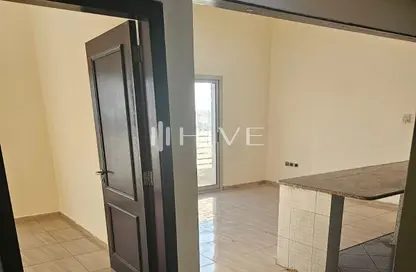 Apartment - 1 Bedroom - 2 Bathrooms for sale in Tasaheel building - Al Qusais Industrial Area - Al Qusais - Dubai