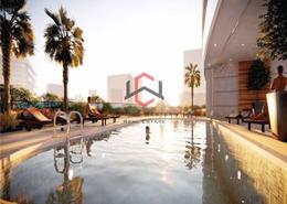 Pool image for: Apartment - 1 bedroom - 2 bathrooms for sale in The V Tower - Dubai Residence Complex - Dubai, Image 1