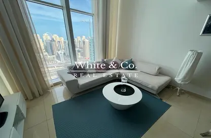 Living Room image for: Apartment - 1 Bedroom - 2 Bathrooms for rent in Laguna Movenpick - Lake Allure - Jumeirah Lake Towers - Dubai, Image 1