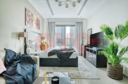 Living Room image for: Apartment - 1 Bathroom for rent in Elite Downtown Residence - Downtown Dubai - Dubai, Image 1