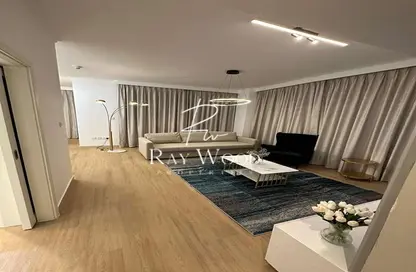 Living Room image for: Apartment - 2 Bedrooms - 3 Bathrooms for rent in Burj Views B - Burj Views - Downtown Dubai - Dubai, Image 1