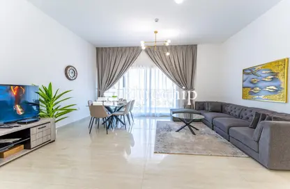 Living / Dining Room image for: Apartment - 2 Bedrooms - 3 Bathrooms for rent in Zubaida Residency - Majan - Dubai, Image 1