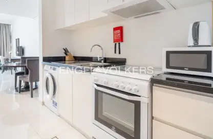Kitchen image for: Apartment - 1 Bathroom for rent in Ghalia - District 18 - Jumeirah Village Circle - Dubai, Image 1