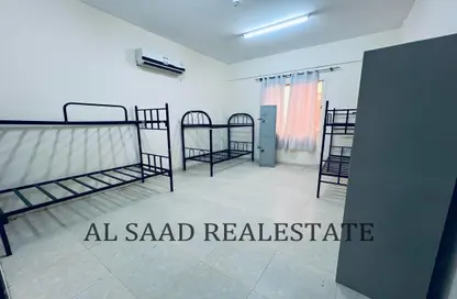 Room / Bedroom image for: Labor Camp - Studio for rent in Al Sarouj Street - Central District - Al Ain, Image 1