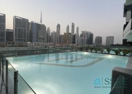 Pool image for: Apartment - 2 bedrooms - 3 bathrooms for rent in Binghatti Canal - Business Bay - Dubai, Image 1
