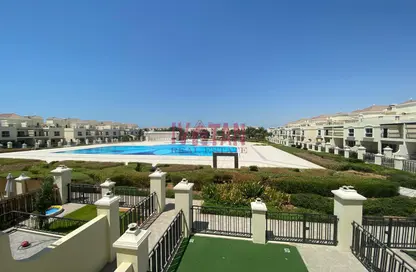 Pool image for: Townhouse - 3 Bedrooms - 4 Bathrooms for sale in Bayti Townhouses - Al Hamra Village - Ras Al Khaimah, Image 1