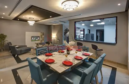 Living / Dining Room image for: Townhouse - 3 Bedrooms - 4 Bathrooms for rent in Al Jazirah Al Hamra - Ras Al Khaimah, Image 1
