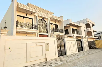 Villa - 5 Bedrooms - 7 Bathrooms for sale in Ajman Hills - Al Alia - Ajman