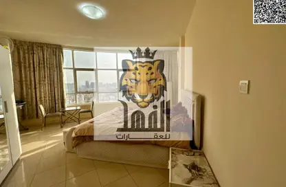 Apartment - 1 Bedroom - 2 Bathrooms for rent in Orient Tower 1 - Orient Towers - Al Bustan - Ajman