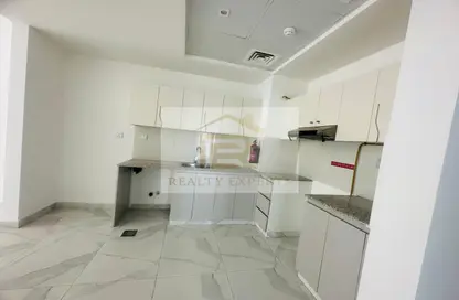 Kitchen image for: Apartment - 2 Bedrooms - 2 Bathrooms for rent in Millennium Binghatti Residences - Business Bay - Dubai, Image 1