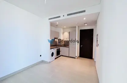 صورة لـ مطبخ شقة - غرفة نوم - 1 حمام للبيع في شوبا كريك فيستاس.تاور A - صبحا هارتلاند - مدينة الشيخ محمد بن راشد - دبي ، صورة رقم 1