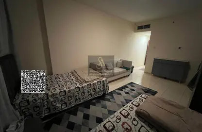 شقة - غرفة نوم - 2 حمامات للبيع في أورينت تاور 1 - أورينت تاور - البستان - عجمان