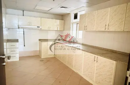 Kitchen image for: Apartment - 1 Bedroom - 2 Bathrooms for rent in Amber Tower - Muwaileh - Sharjah, Image 1