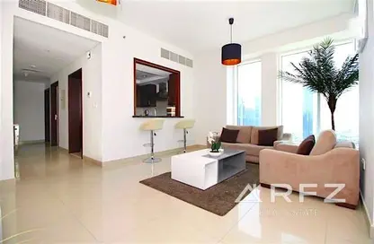 Living Room image for: Apartment - 1 Bedroom - 2 Bathrooms for sale in 29 Burj Boulevard Tower 1 - 29 Burj Boulevard - Downtown Dubai - Dubai, Image 1