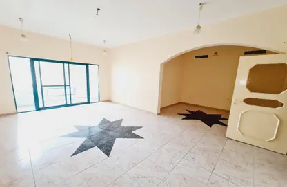 Empty Room image for: Apartment - 2 Bedrooms - 3 Bathrooms for rent in Ibtikar 1 - Al Majaz 2 - Al Majaz - Sharjah, Image 1