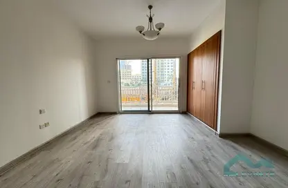 Empty Room image for: Apartment - 1 Bathroom for rent in Maple 1 - Emirates Gardens 2 - Jumeirah Village Circle - Dubai, Image 1