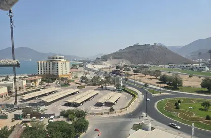 شقة - غرفة نوم - 2 حمامات للبيع في خورفكان - الشارقة