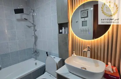 Apartment - 2 Bedrooms - 2 Bathrooms for sale in Orient Tower 1 - Orient Towers - Al Bustan - Ajman