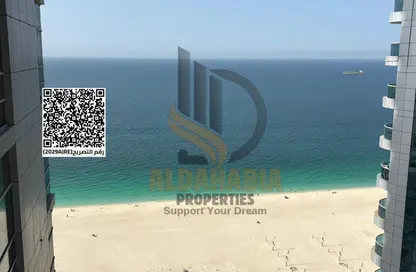 Apartment - 2 Bedrooms - 2 Bathrooms for sale in Corniche Tower - Ajman Corniche Road - Ajman