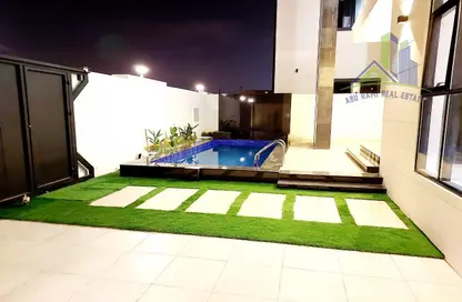 Pool image for: Villa - 4 Bedrooms - 5 Bathrooms for sale in Al Zaheya Gardens - Al Zahya - Ajman, Image 1