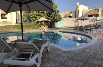 Pool image for: Villa - 4 Bedrooms - 4 Bathrooms for rent in Al Musalla Area - Al Karamah - Abu Dhabi, Image 1