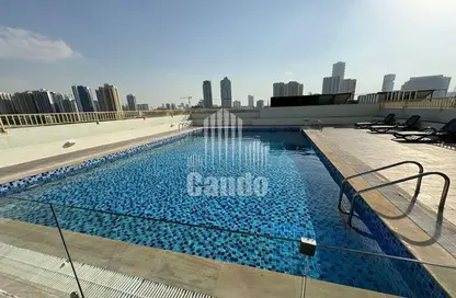Pool image for: Apartment - 1 Bathroom for rent in Pulse Smart Residence - Jumeirah Village Circle - Dubai, Image 1