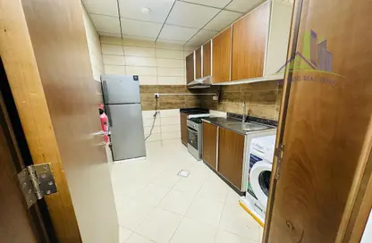 Kitchen image for: Apartment - 1 Bathroom for rent in Sheikh Jaber Al Sabah Street - Al Naimiya - Al Nuaimiya - Ajman, Image 1