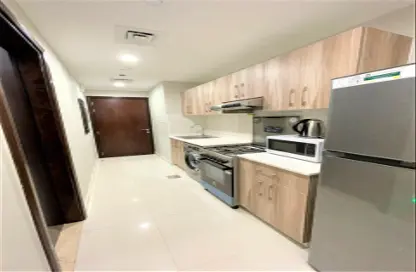 صورة لـ مطبخ شقة - غرفة نوم - 1 حمام للبيع في برج هيرا - مدينة دبي الرياضية - دبي ، صورة رقم 1
