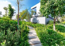 Garden image for: Villa - 2 bedrooms - 5 bathrooms for sale in Robinia - Masaar - Tilal City - Sharjah, Image 1