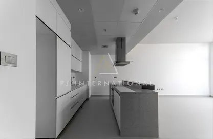 صورة لـ مطبخ شقة - 2 غرف نوم - 3 حمامات للايجار في اويا رزيدنس‎ - مدينة السيارات - دبي ، صورة رقم 1