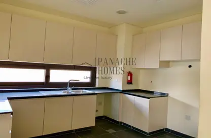 Kitchen image for: Townhouse - 3 Bedrooms - 4 Bathrooms for rent in Richmond - DAMAC Hills - Dubai, Image 1