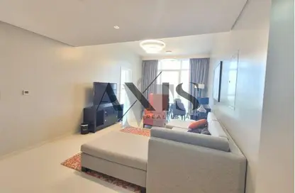 Living Room image for: Apartment - 1 Bedroom - 2 Bathrooms for sale in Artesia - DAMAC Hills - Dubai, Image 1