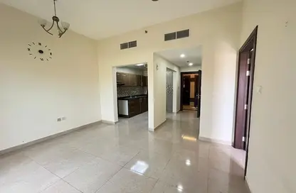 Empty Room image for: Apartment - 1 Bedroom - 2 Bathrooms for rent in Damisco 2 - Jumeirah Village Circle - Dubai, Image 1