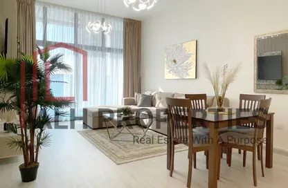 Living / Dining Room image for: Apartment - 2 Bedrooms - 3 Bathrooms for rent in Sydney Tower - Jumeirah Village Circle - Dubai, Image 1