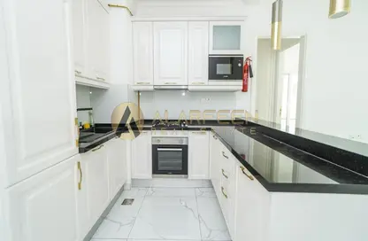 صورة لـ مطبخ شقة - غرفة نوم - 2 حمامات للايجار في فينشيتوري بوليفارد - ارجان - دبي ، صورة رقم 1