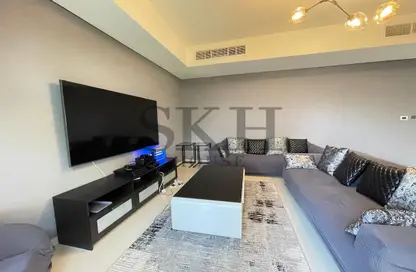 Living Room image for: Villa - 3 Bedrooms - 3 Bathrooms for rent in Janusia - The Roots DAMAC Hills 2 - Damac Hills 2 - Dubai, Image 1