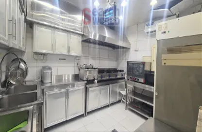 Kitchen image for: Shop - Studio - 1 Bathroom for sale in Khalidiya Twin Towers - Al Khalidiya - Abu Dhabi, Image 1